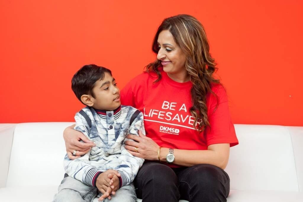 DKMS Promo shot of young boy sitting with an older woman.