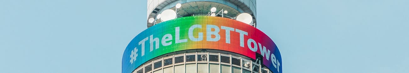 Telecom tower with the #TheLGBTTower wrapper on top