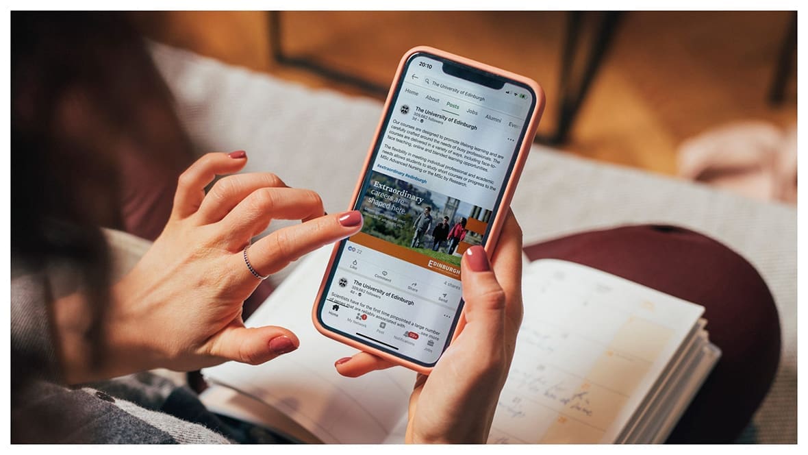 Edinburgh University Social Media post being displayed on a mobile device.